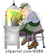 Male Jeweller Fixing Gold Wedding Ring Clipart Picture