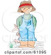 Poster, Art Print Of Little Boy Wearing Overalls And A Hat Smiling And Holding A Stuffed Bunny Behind His Back