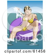 Poster, Art Print Of Sexy Woman In A Skimpy Yellow Bikini Floating In An Inner Tube