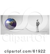 Poster, Art Print Of Male Environmentalist Standing And Facing A 3d Globe