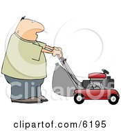 Man Cutting Grass With A Lawnmower
