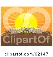 Royalty Free RF Clipart Illustration Of A Giant Sun Setting In Orange And Yellow Behind A Grove Of Trees On A Hill