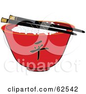 Pair Of Chopsticks Over Rice In A Red Chinese Bowl