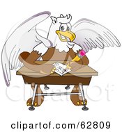 Griffin Character School Mascot Doing Homework At A Desk