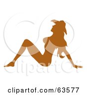 Royalty Free RF Clipart Illustration Of A Brown Silhouetted Nude Cowgirl Sitting On The Floor And Wearing A Hat by Andy Nortnik
