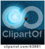 Royalty Free RF Clipart Illustration Of A Hot Air Balloon Near Mountains In The Moonlight