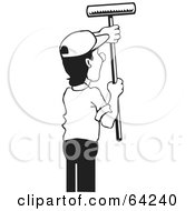 Poster, Art Print Of Black And White Male Painter Using A Roller Brush