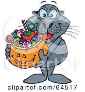 Poster, Art Print Of Trick Or Treating Seal Holding A Pumpkin Basket Full Of Halloween Candy