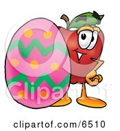 Red Apple Character Mascot Standing Beside An Easter Egg