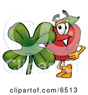 Red Apple Character Mascot With A Green Four Leaf Clover On St Paddys Or St Patricks Day