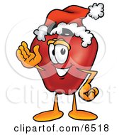Red Apple Character Mascot Wearing A Santa Hat And Waving