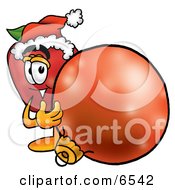 Red Apple Character Mascot Wearing A Santa Hat Next To A Christmas Bauble by Mascot Junction