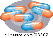 Poster, Art Print Of Blue And Orange Pills On A Gray Oval