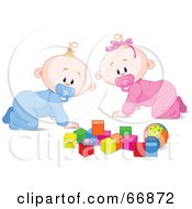 Baby Boy And Girl Crawing By Toys