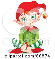 Poster, Art Print Of Happy Christmas Elf Sitting On The Floor