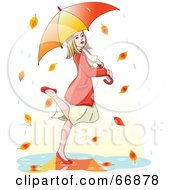 Poster, Art Print Of Blond Woman Dancing In Autumn Rain Under An Umbrella