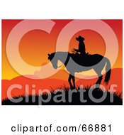 Poster, Art Print Of Silhouetted Cowboy On Horseback Against An Orange Sunset