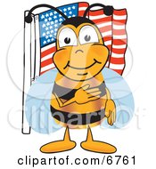 Bee Mascot Cartoon Character Giving The Pledge Of Allegiance Near An American Flag