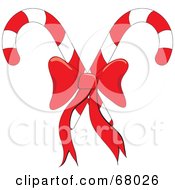 Poster, Art Print Of Crossed Christmas Candy Canes With A Red Bow