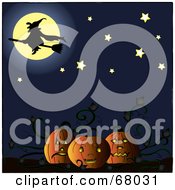 Silhouetted Witch In Front Of A Full Moon Above A Pumpkin Patch