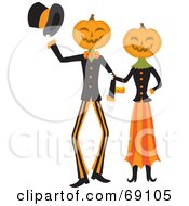Pumpkin Head Couple Walking Arm In Arm