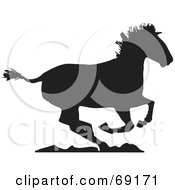 Royalty Free RF Clipart Illustration Of A Black Silhouette Of A Running Horse On Rocks