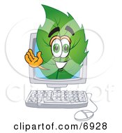 Leaf Mascot Cartoon Character On A Computer Screen