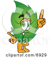 Clipart Picture Of A Leaf Mascot Cartoon Character Pointing Upwards