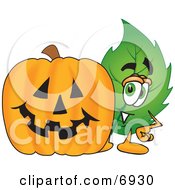 Leaf Mascot Cartoon Character With A Halloween Pumpkin