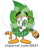Clipart Picture Of A Leaf Mascot Cartoon Character Looking Through A Magnifying Glass by Toons4Biz