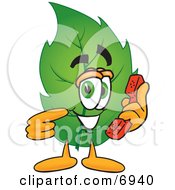 Leaf Mascot Cartoon Character Holding A Telephone