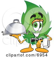 Clipart Picture Of A Leaf Mascot Cartoon Character Holding A Serving Platter by Toons4Biz