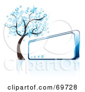 Poster, Art Print Of Blue Winter Tree Beside A Shiny Blank Sign