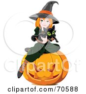 Cute Halloween Witch Holding A Kitten And Sitting On A Pumpkin