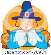 Praying Pilgrim With Pumpkins Over An Orange Circle