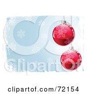 Royalty Free RF Clipart Illustration Of Two Red Christmas Baubles With Snow Hanging On A Blue Background With Grunge And Snowflakes