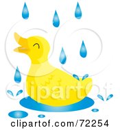 Poster, Art Print Of Yellow Duck Playing In A Puddle On A Rainy Day