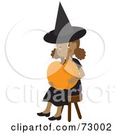 Poster, Art Print Of Happy Black Girl In A With Costume Sitting And Holding A Halloween Pumpkin