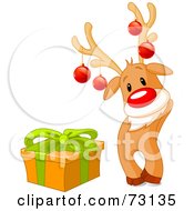 Poster, Art Print Of Cute Rudolph The Red Nosed Reindeer Wearing Baubles And Standing By A Present