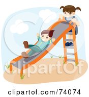 Boy And A Girl Playing On A Slide On A Playground