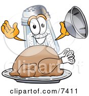 Salt Shaker Mascot Cartoon Character Serving A Thanksgiving Turkey On A Platter