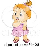Little Girl Wearing A Pink Towel And Flip Flops