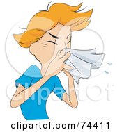 Sick Man Sneezing Into A Tissue