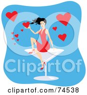 Sexy Woman Sitting On A Giant Cocktail Glass With Hearts