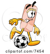 Bandaid Bandage Mascot Cartoon Character Kicking A Soccer Ball by Mascot Junction