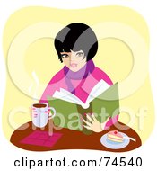 Warm Woman Drinking Coffee And Eating Cake While Reading A Book