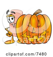 Poster, Art Print Of Bandaid Bandage Mascot Cartoon Character With A Carved Halloween Pumpkin