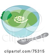 Bowl Of Broccoli Soup With A Swirl And Seasoning Garnish