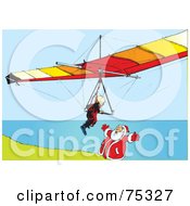 Paraglider Flying Towards Santa On A Coastal Cliff