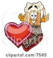 Beer Mug Mascot Cartoon Character With An Open Box Of Valentines Day Chocolate Candies